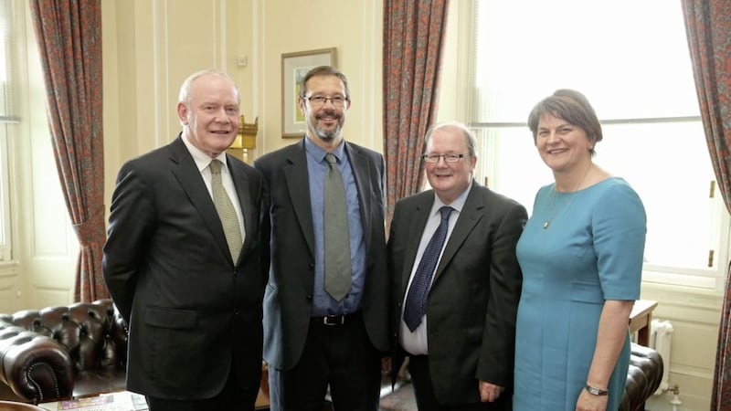 Arlene Foster and Martin McGuinness with Neville Armstrong and Dominic Bryans in June last year to announce the commission panel 