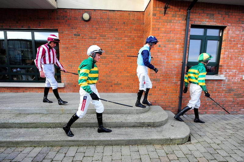 Jockeys (left to right) Davy Russell, Barry Geraghty, Robert Power and Mark Walsh walk to the parade ring during the December 2016 Winter Festival at Fairyhouse racecourse in Co&nbsp;Meath