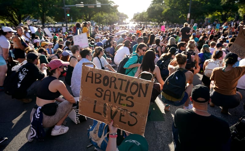 Demonstrators march and gather near the Texas Capitol following the US Supreme Court’s decision to overturn Roe v Wade on June 24, 2022 (Eric Gay/AP)