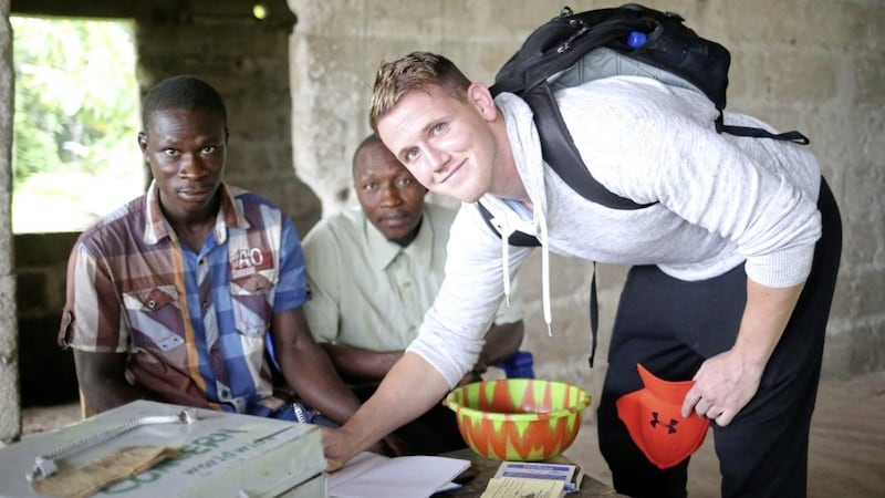 Ireland international and Ulster winger Craig Gilroy visits a village savings and loans scheme set up by Concern Worldwide in Tonkolili district, Sierra Leone. Picture by Jonathan Porter, Press Eye 
