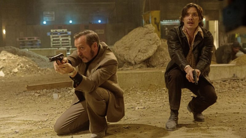 Smiley in action with co-star Cillian Murphy in Free Fire 