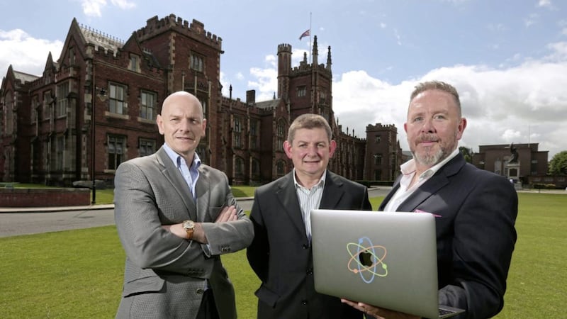 Professor Christopher Elliott, left, of Queen&rsquo;s University Belfast announces the partnership with Kieran Kelly, right, and Brendan Smyth, centre, of arc-net 