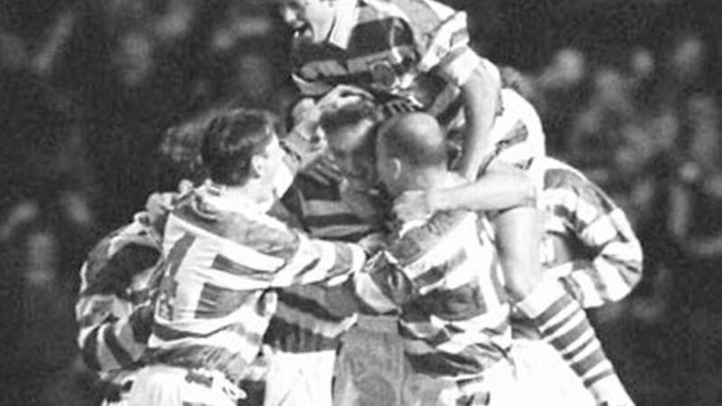 HAPPY BHOYS: Celtic defender Malky Mackay is mobbed by team-mates after his opening goal against Rangers 