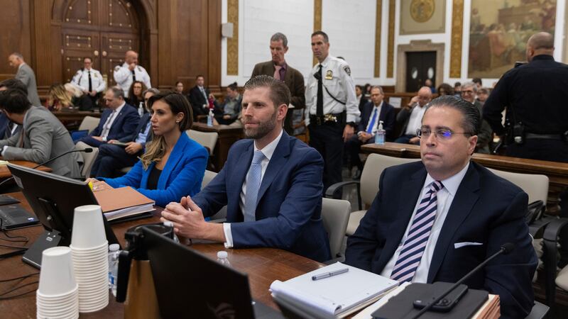 Eric Trump, centre, appears at the fraud trial of his father, former president Donald Trump, at New York Supreme Court (Jeenah Moon/Pool Photo via AP)