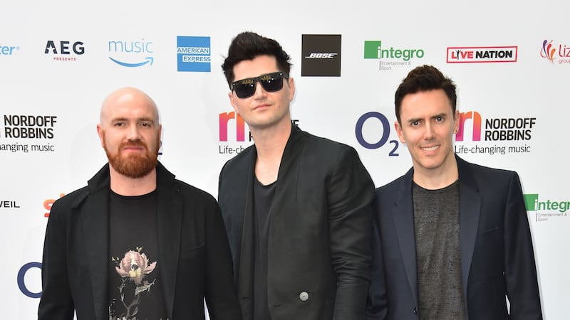 The band were attending the 2018 Silver Clef Awards.