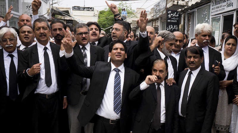 Lawyers chant slogans to condemn Monday&#39;s suicide bombing, in Islamabad, Pakistan, on Tuesday. Picture by BK Bangash/AP 