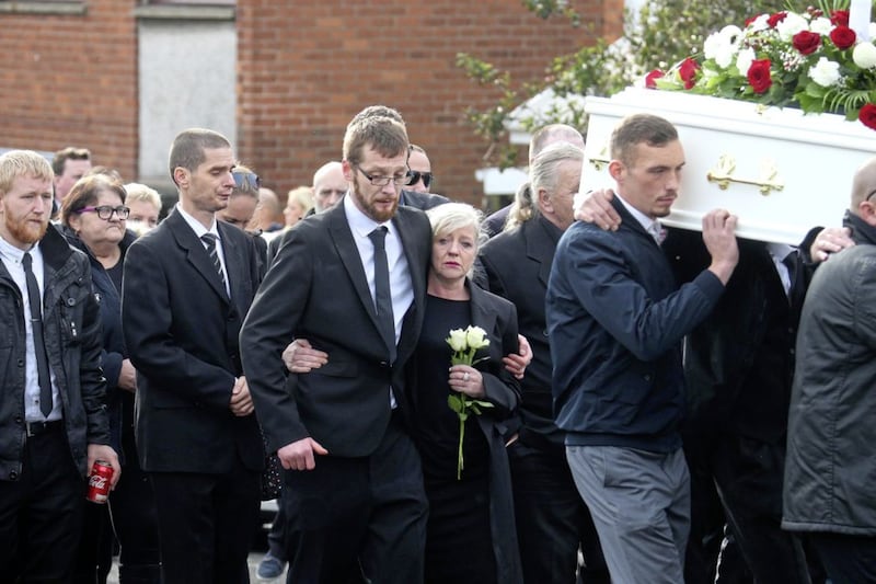 Mark Busa and his partner Donna Thomas at the funeral of his son Ryan Busa (10) who died after a suspected dog attack at his home in Glengormley Picture by Mal McCann