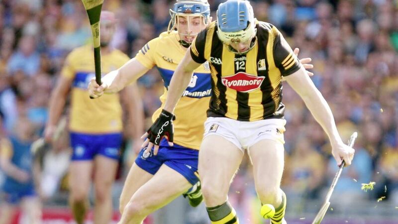 Clare&#39;s David McInerney and Kilkenny&#39;s TJ Reid in action during the GAA Hurling All-Ireland Senior Championship Semi-Final between Clare and Kilkenny. Picture by Philip Walsh. 