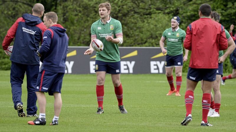 Iain Henderson has a chat with Lions forwards coach Steve Borthwick during a training sesssion at the Wales Rugby Union Centre of Excellence yesterday Picture: PA 