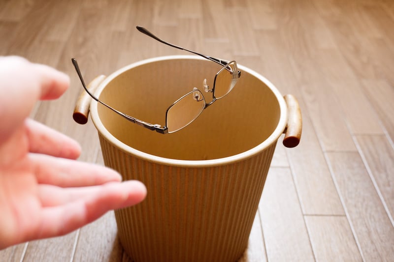 Throw away the glasses that don't fit and are no longer needed in the trash can