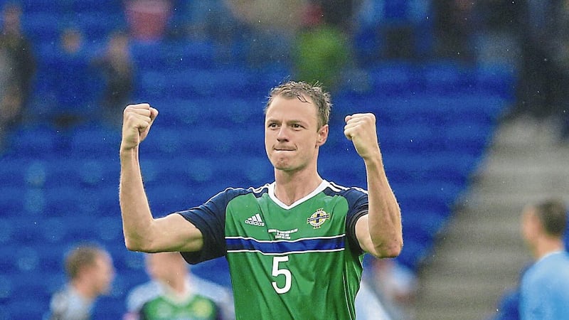 Northern Ireland&#39;s Jonny Evans celebrates the 2-0 win over Ukraine at Euro 2016, his favourite match as he reaches a century of caps in Greece tonight. 