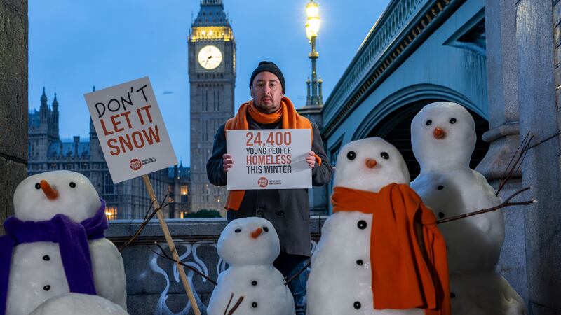 Centrepoint stages a snowman protest to highlight the 24,400 young people who will face homelessness this Winter (Jeff Moore/PA)Don’t let it snowPicture Shows Paul Brocklehurst, Centrepoint Senior Helpline Manager