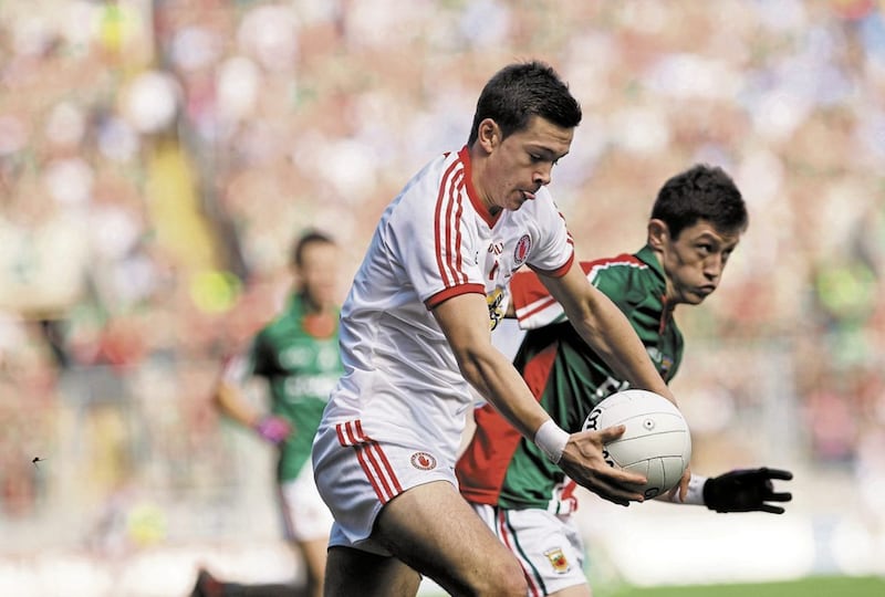 Mayo&#39;s Seamus Cunniffe chases Tyrone&#39;s Conor McKenna in the 2013 All-Ireland Minor final at Croke Park, Dublin. Picture by Colm O&#39;Reilly 