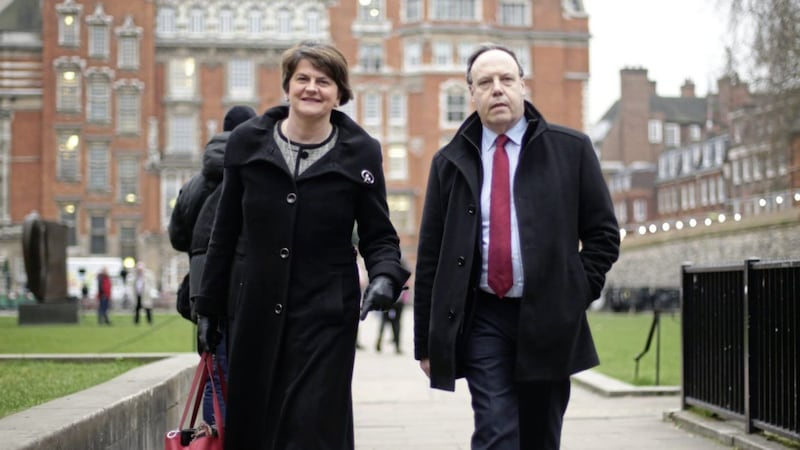 DUP leader Arlene Foster and deputy leader Nigel Dodds speaking to the media on College Green in Westminster, London yesterday PICTURE: Yui Mok/PA 