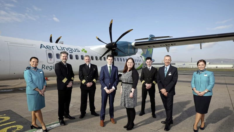 Head of commercial at Emerald Airlines, Ciar&aacute;n Smith, and Belfast City Airport&#39;s aviation development manager, Ellie McGimpsey (both centre), with Aer Lingus Regional crew. 
