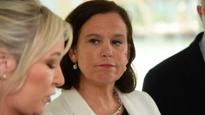 Sinn Fein President Mary Lou McDonald (right) listens as Deputy Leader Michelle O’Neill (left) speaks to the media at a post election press conference in Belfast (Mark Marlow/PA)