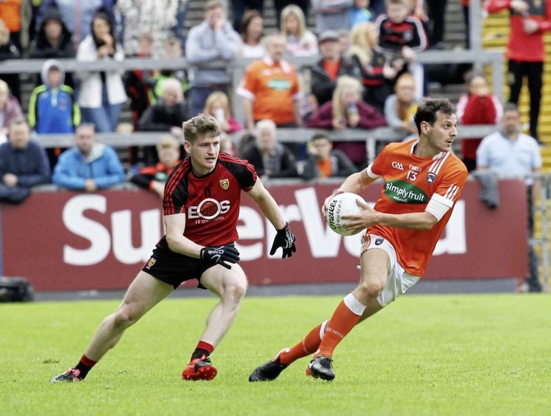 Jamie Clarke will start for Armagh in Newry, but whether Conor Maginn (left) is in the Down team could have a big impact on the Mourne side&#39;s attacking game. Picture by Philip Walsh 