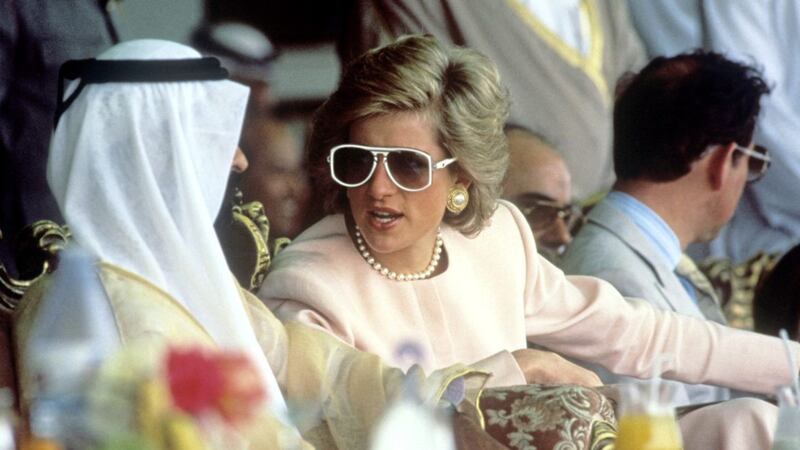 Princess Diana wearing stylish sunglasses in the 80s 