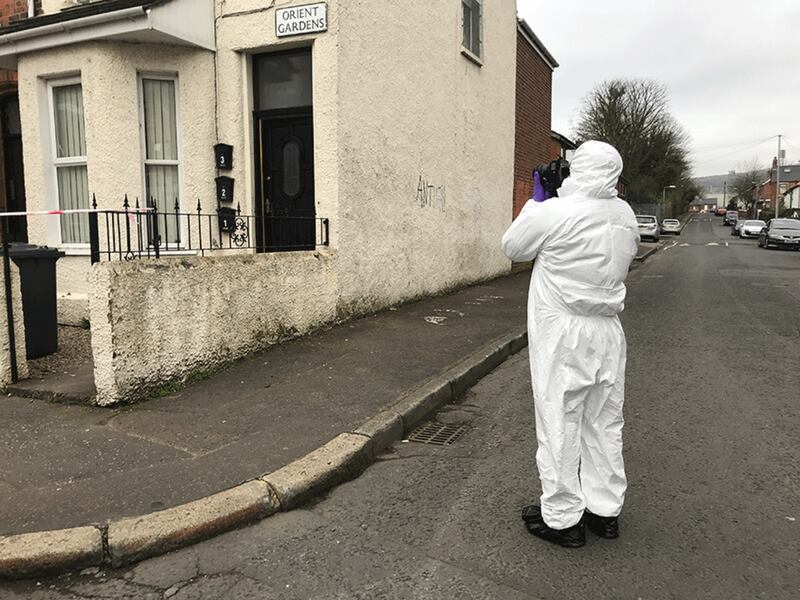 &nbsp;A forensic officer at the scene of the murder in Orient Gardens, north Belfast. Picture by Mal McCann