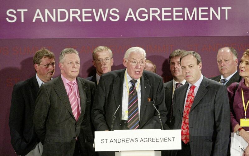 DUP leader Ian Paisley and party colleagues pictured at St Andrews in 2006. He would later agree to share power with Sinn Féin's Martin McGuinness