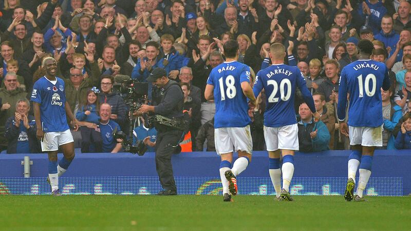 Everton midfielder Gareth Barry runs to congratulate Arouna Kone after the striker completed his hat-trick against Sunderland at Goodison Park last Sunday<br />Picture: PA&nbsp;