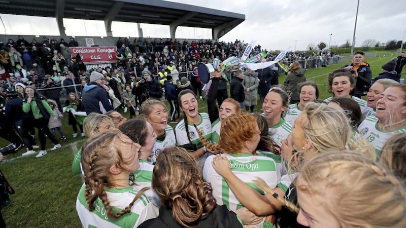 Br&iacute;din&iacute; &Oacute;ga players celebrate with the Phil McBride Cup after their win over Knockannan in the AIB All-Ireland Junior Club Camogie Championship final in Kinnegad Picture: Bryan Keane/Inpho 