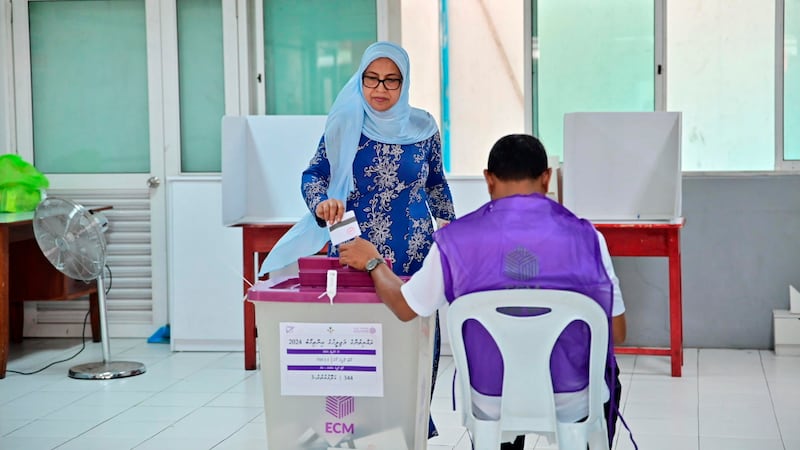 Maldivians are voting in parliamentary elections, keenly watched by India and China as they vie for influence in the archipelago nation (Mohamed Sharuhaan/AP)