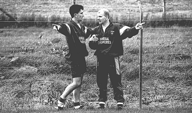 Declan Bonner and Barry McGowan talk tactics at a team training session 20 years ago. McGowan describes Bonner as one of the biggest characters he played with 