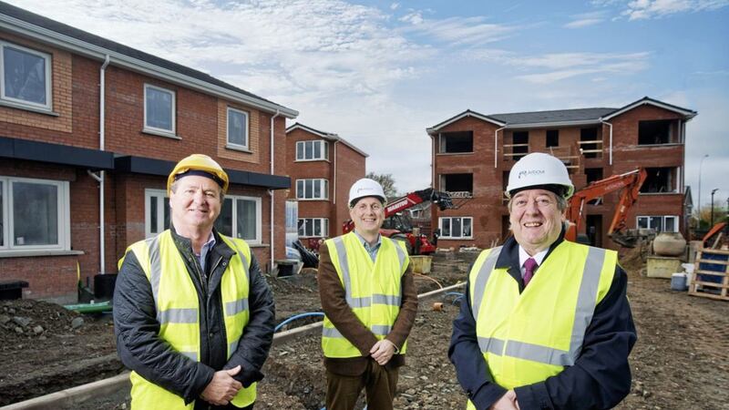 Pictured on the Arbour Housing site in Lurgan are (from left) developer Conor Lavery (managing director at Charles Lavery &amp; Sons), Ben Collins (NI Federation of Housing Associations chief executive) and Kieran Matthews (Arbour Housing chief executive) 