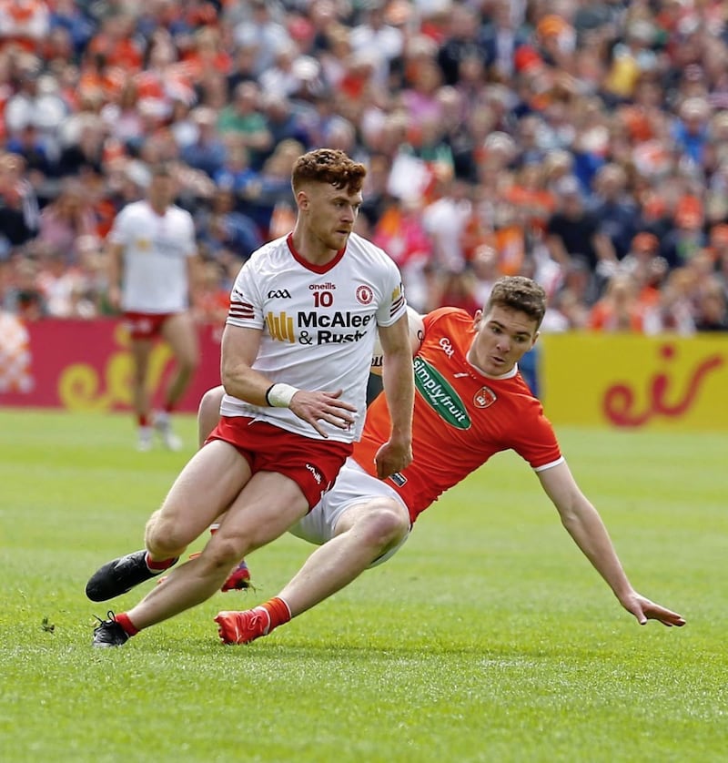 Armagh&#39;s Jarly &Oacute;g Burns and Tyrone&#39;s Conor Meyler battle it out at the Athletic Grounds. Pic Philip Walsh 