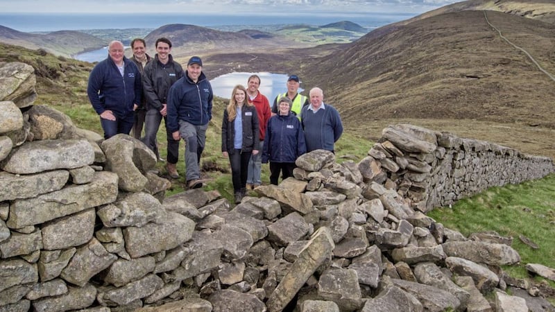 Park of the team involved in the Mourne Wall restoration project 