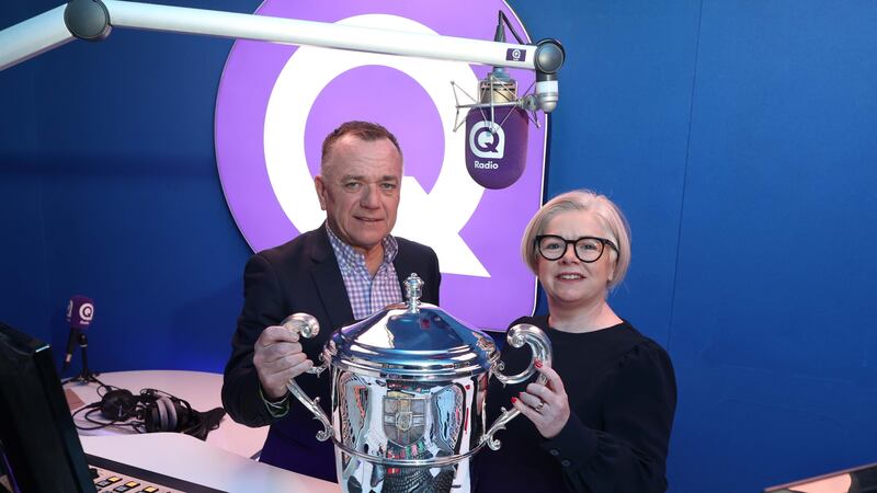 Ulster GAA PRO Michael McArdle with IntoMedia deputy CEO Sinead Cavanagh in the Q Radio studio at the announcement of the station’s continued official media partnership with the Ulster SFC