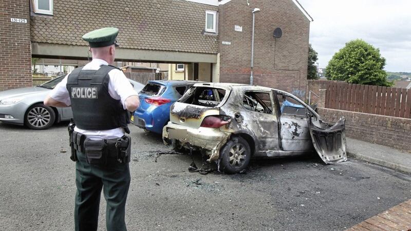 A car believed to have been used in the shooting was found burnt out in the nearby Lincoln Court area of the Waterside. Picture by Margaret McLaughlin 