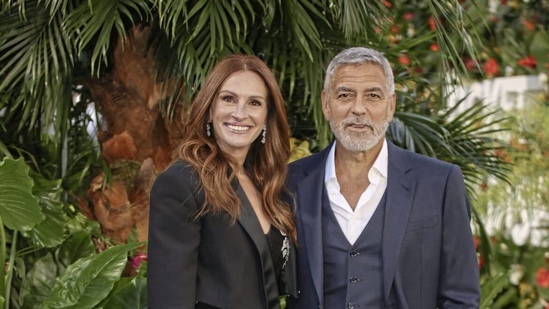 Julia Roberts, left, and George Clooney at for the world premiere of romantic comedy Ticket To Paradise, in cinemas from tomorrow. 