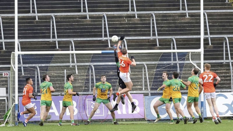 Donegal goalkeeper Shaun Patton rises high with Armagh&#39;s Cathal McKenna during last weekend&#39;s Ulster SFC semi-final win over Armagh. Picture by Margaret McLaughlin 