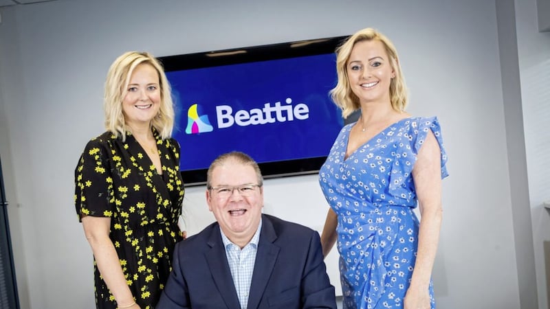 Serious founder and managing director David McCavery (centre) whose company has announced a merger with Beattie to form Beattie Ireland, celebrates the news with Joanne Spence (left), Beattie Scotland director, and Laurna Woods, chief executive of Beattie 