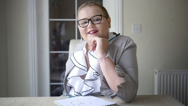 Skye Duncan, 14, taught herself to write with her opposite hand just three weeks after having her right arm amputated.
