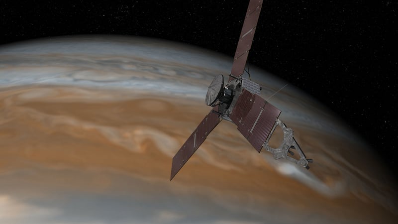 Artist's impression issued by NASA of the Juno spacecraft approaching Jupiter