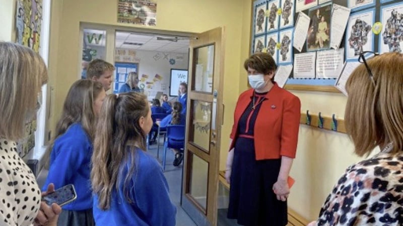 Arlene Foster meeting pupils and staff at Maguiresbridge primary school in Co Fermanagh yesterday 