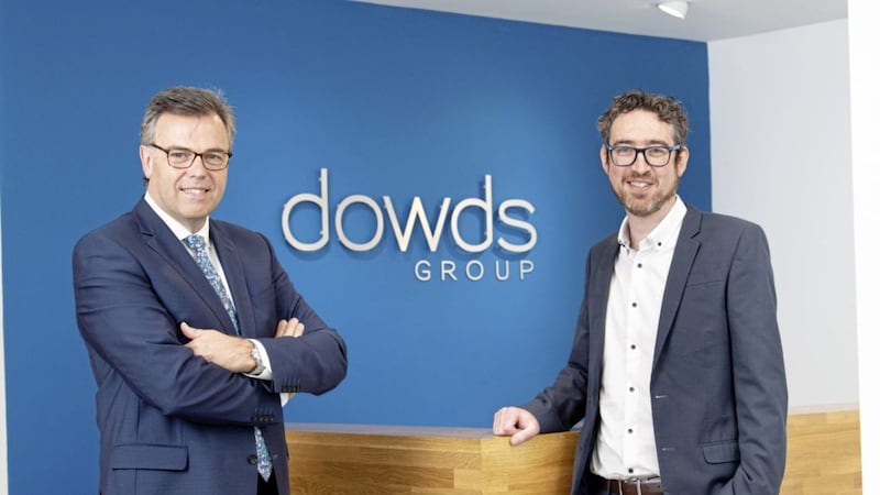 Dowds Group managing director James Dowds with outgoing Invest NI chief executive Alastair Hamilton at an announcement earlier this year that the company is creating 68 more jobs 