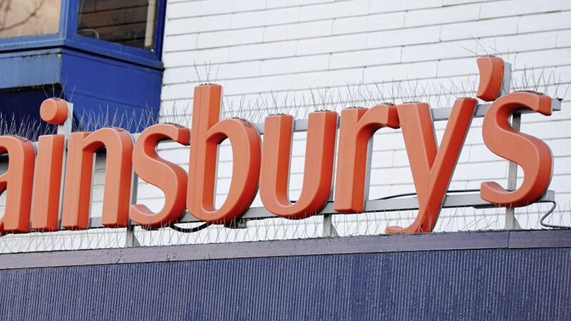 Sainsbury&#39;s has notched up a rise in annual underlying profits but saw hefty charges knock its bottom line 