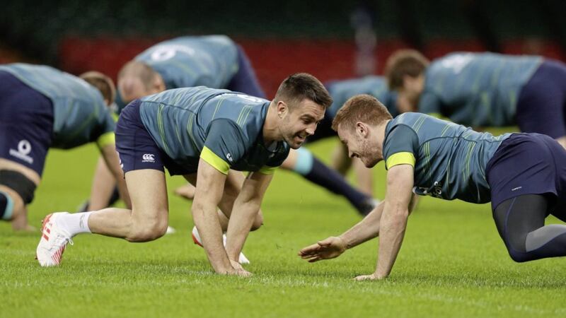 Ireland&#39;s Conor Murray (left) and Paddy Jackson during the captain&#39;s run at the Principality Stadium, Cardiff ahead of the clash with Wales 