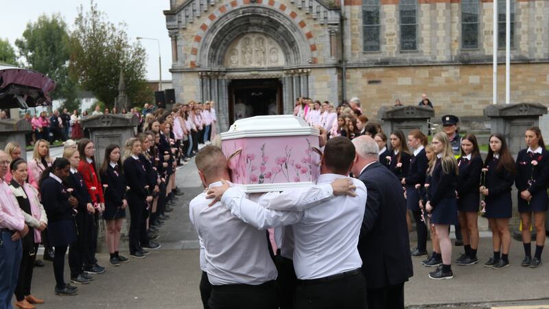 The coffin of crash victim, Zoey Coffey, 18, is carried into Saints Peter and Paul’s Church in Clonmel (Brendan Gleeson/PA)