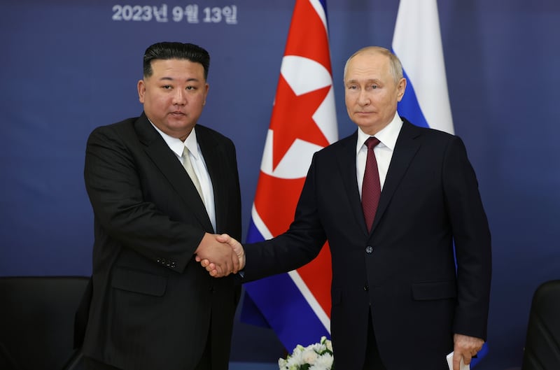 Russian President Vladimir Putin and North Korea’s leader Kim Jong Un shake hands during their meeting in September (Vladimir Smirnov, Sputnik, Kremlin Pool Photo via AP)