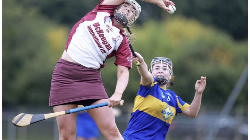 Cushendall&#39;s Dervla Cosgrove at full stretch to win possession against Rossa in the Antrim Senior Championship semi-final. Picture: Dylan McIlwaine 