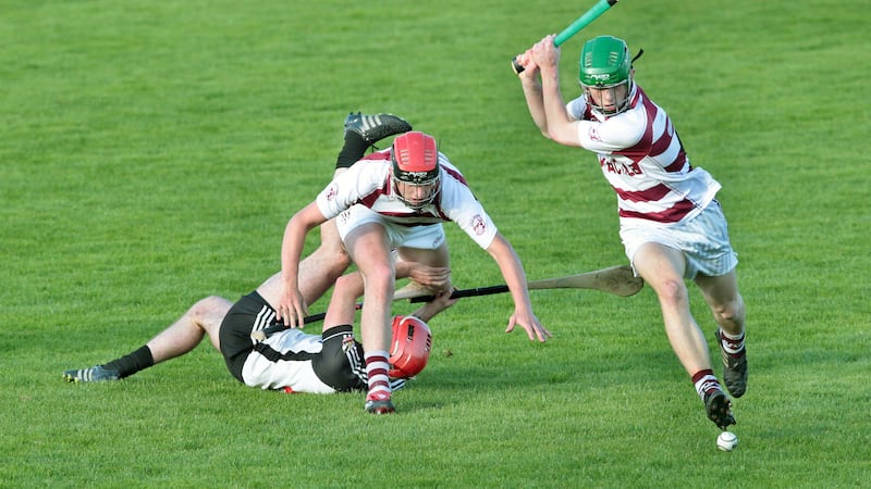 Slaughtneil's Paul McNeill and Michael MacCraith leave Mark Craig of Kevin Lynch's behind during the Derry Senior Hurling Championship semi-final at Owenbeg last Saturday <br />Picture: Margaret McLaughlin&nbsp;