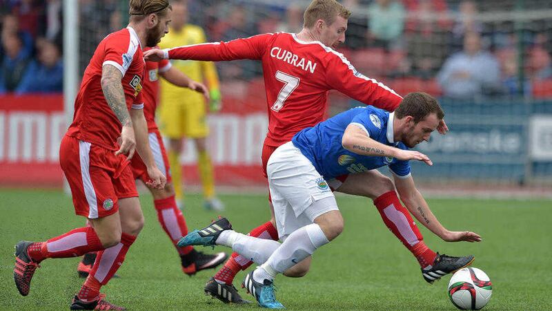 Chris Curran is carrying a knee injury and is likely to miss Tuesday night's County Antrim Shield tie with Linfield