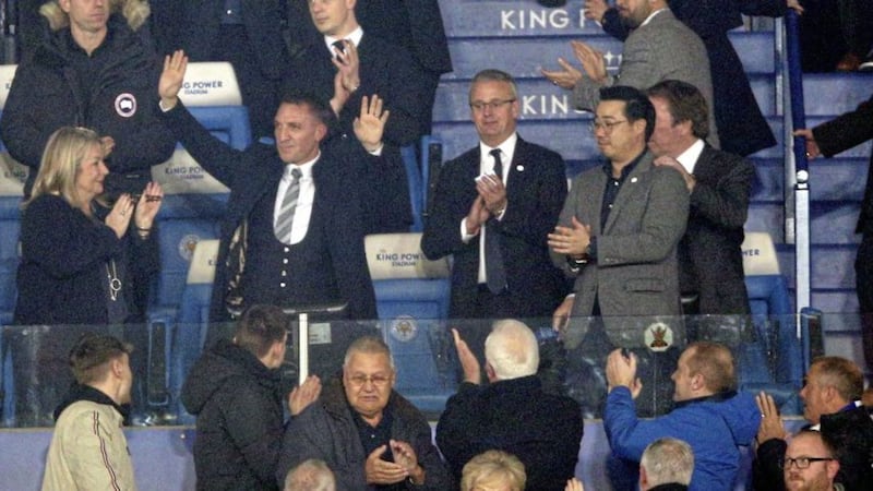 New Leicester City manager Brendan Rodgers waves to the crowds from the stands after being unveiled ahead of the Premier League match against Brighton at the King Power Stadium, Leicester on Tuesday night 