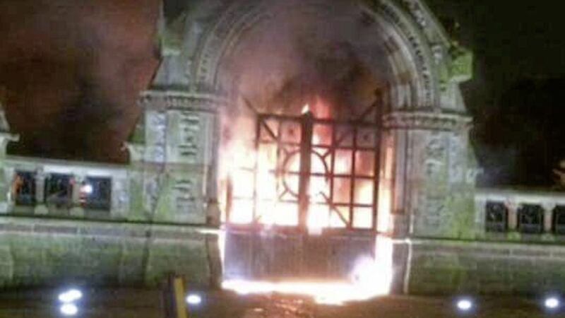The gates of Milltown Cemetery were set alight on Friday evening 