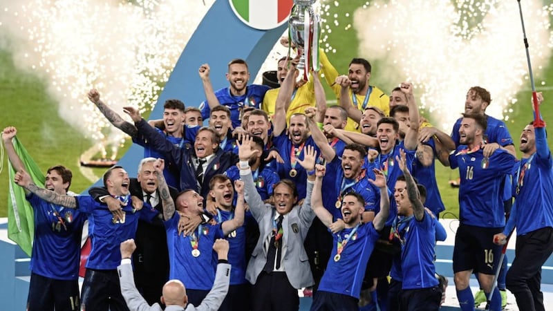 Italian players celebrate after winning the Euro 2020 final soccer match between Italy and England at Wembley stadium in London, Sunday, July 11, 2021. (Facundo Arrizabalaga/Pool via AP). 